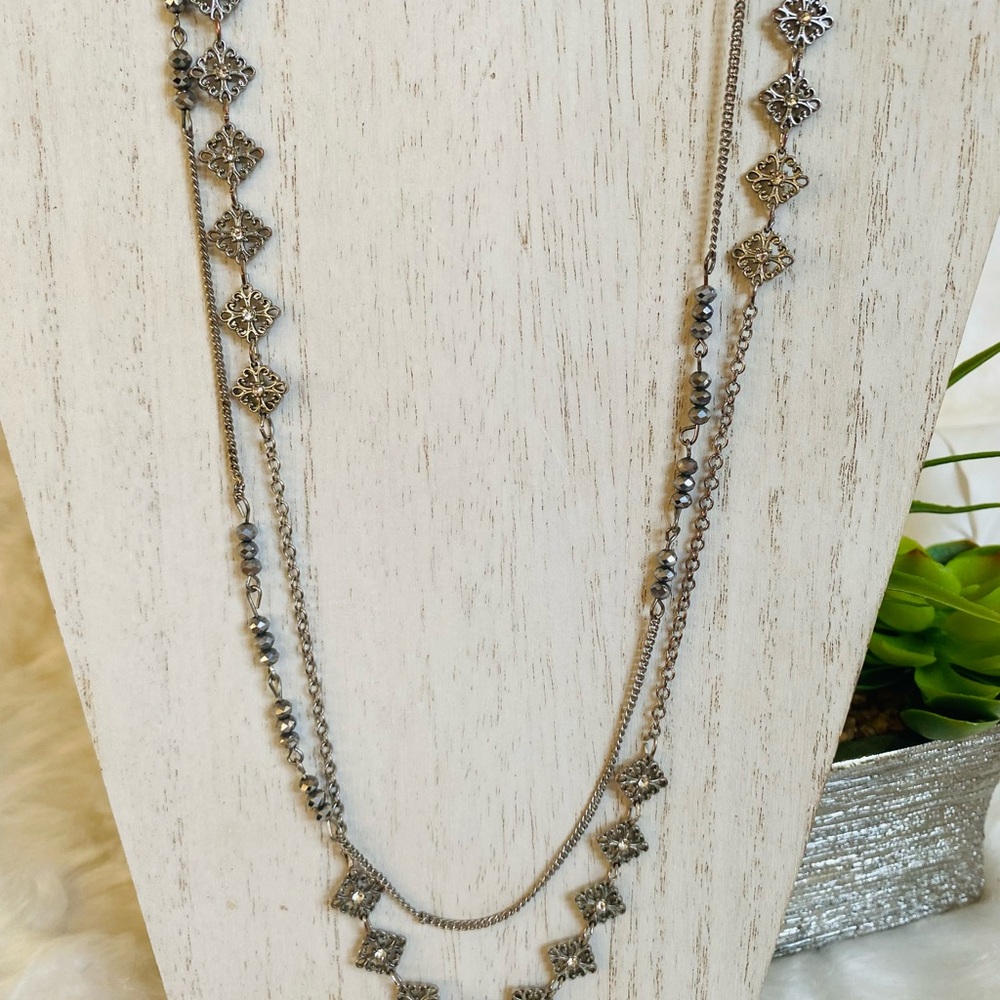 Elegant Silver Necklace With Intricate Detailing